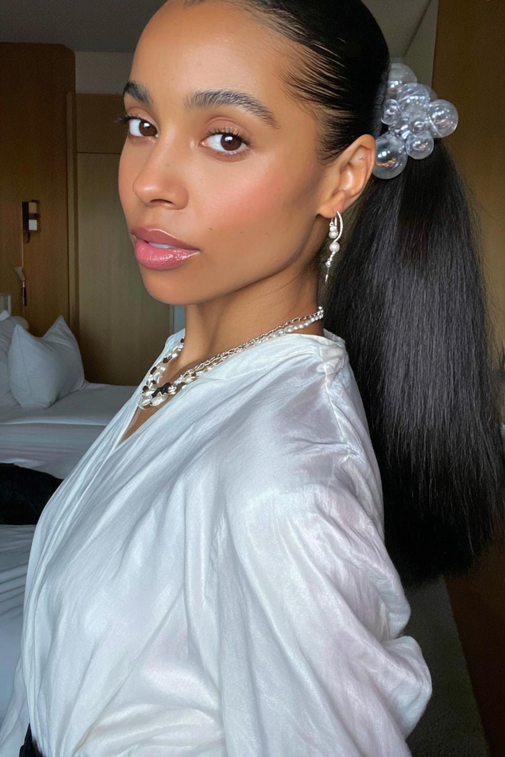 23. Sleek Celebrity Inspired Hairstyles 2026 Bubble Ponytail with Clear Elastics