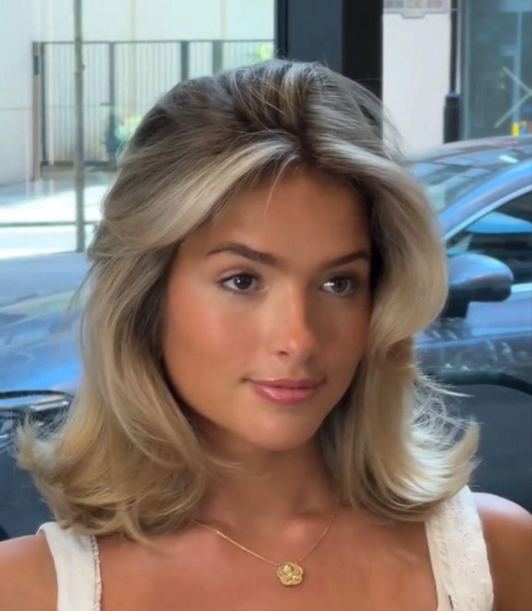 Collarbone length 90s blowout hair