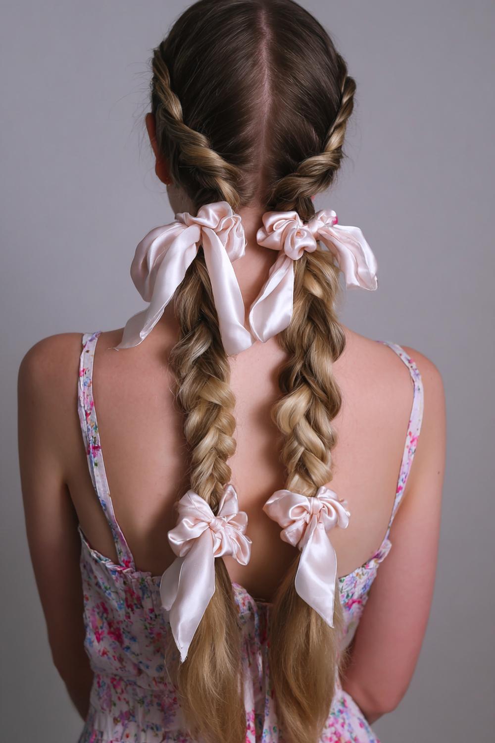 10. Two Low Braids Hairstyle with Middle Part and Satin Scrunchies