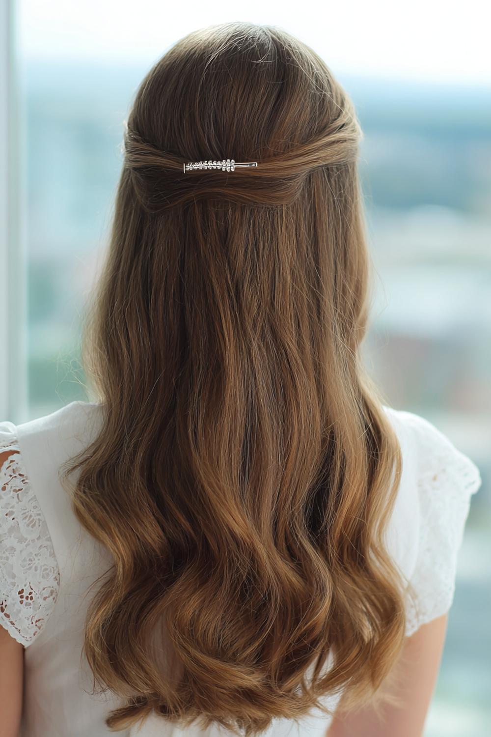 7. Everyday Hairstyles for Women: Half-Up Barrette Style with Smooth Crown