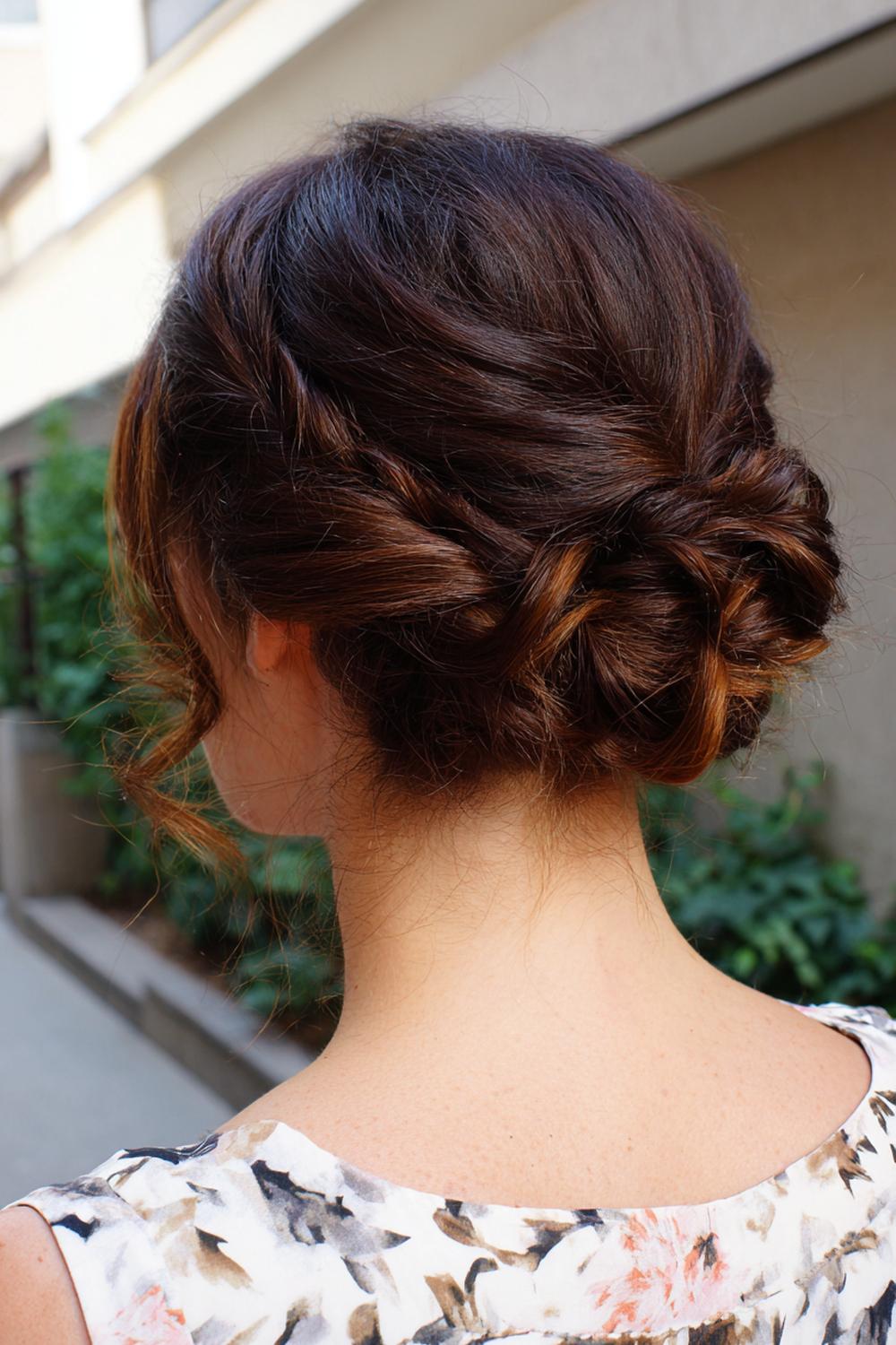 10. Messy Bun Hairstyle with Loose Crown and Framing Tendrils