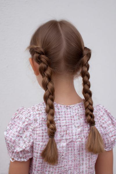 23. Low Braided Pigtails with Soft Parts for hairstyles braids for kids ideas