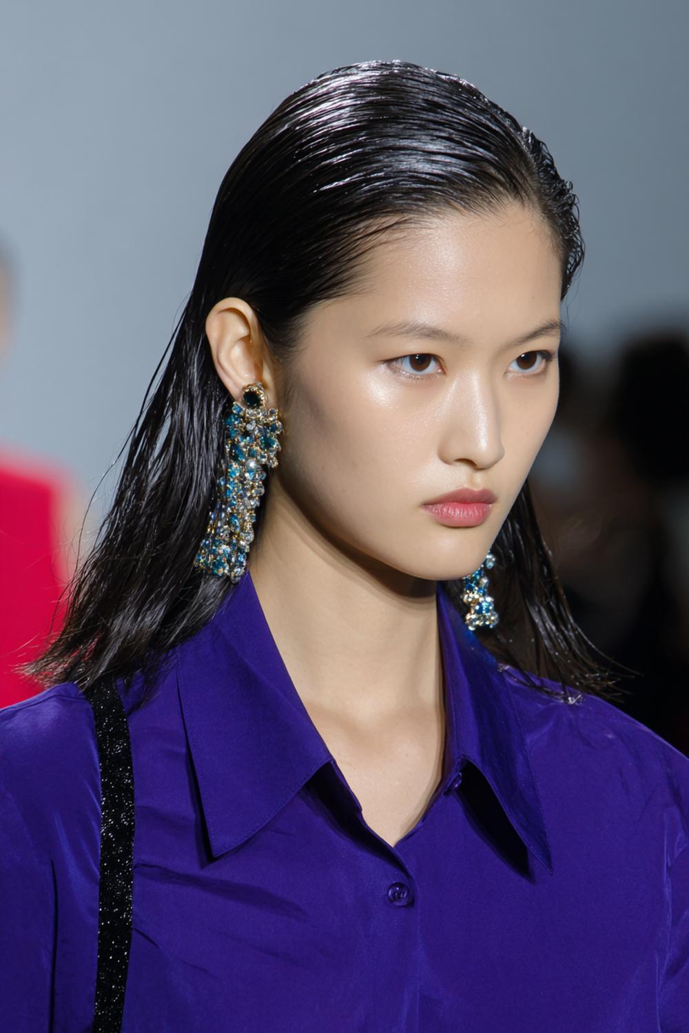 11. Hairstyles for All Hair Types: Wet-Look Slick Back with Bold Statement Earrings