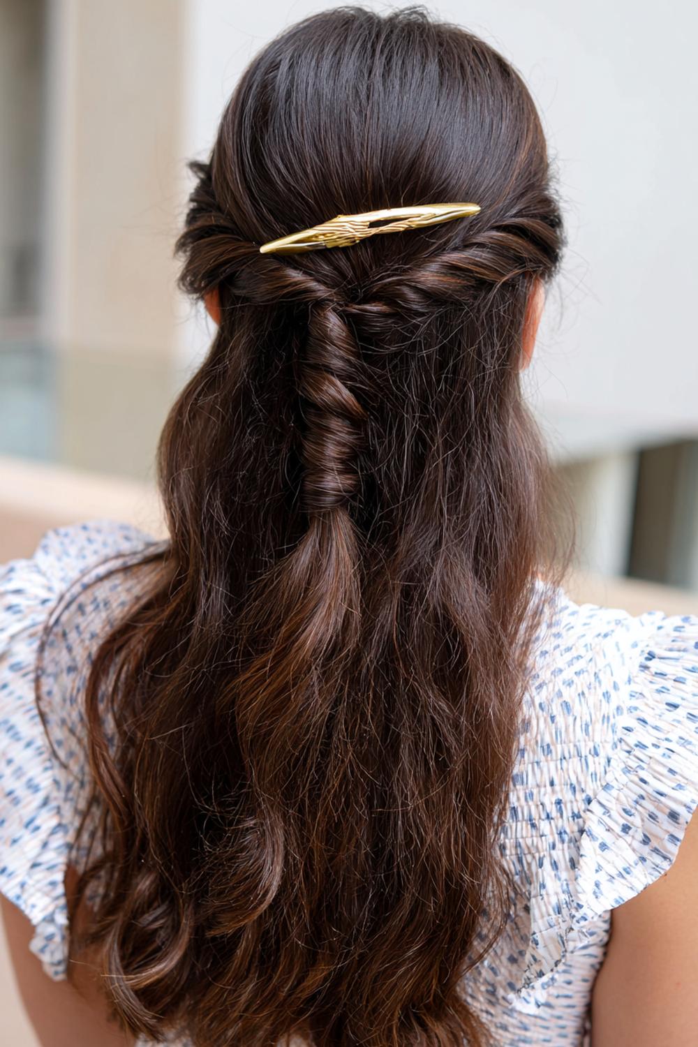 22. Hairstyles for All Hair Types: Twisted Half-Up with Metallic Barrette Accent