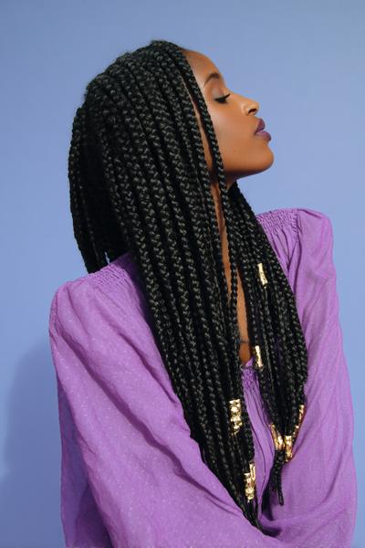 1. Knotless Box Braids for Hairstyles for Black Women Braids With Soft Middle Part and Golden Cuffs