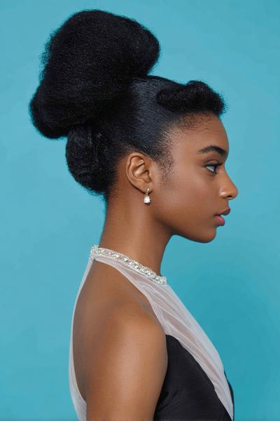 10. Sleek Low Puff for Hairstyles for Black Women Natural Hair With Laid Edges and Satin-Smooth Crown