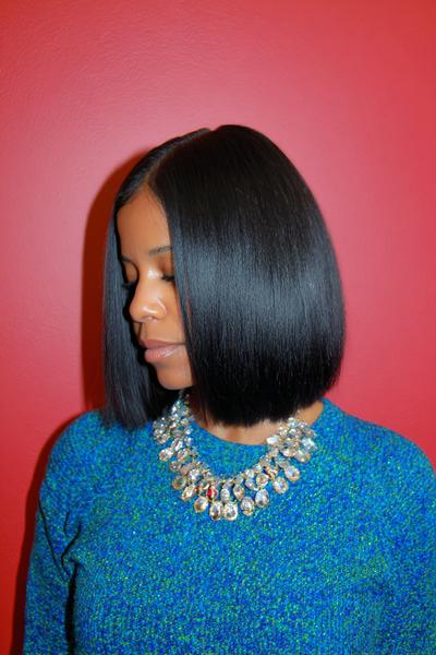 26. Silk Press Bob for Hairstyles for Black Women Straight Hair With Tucked Ends and Mirror Shine