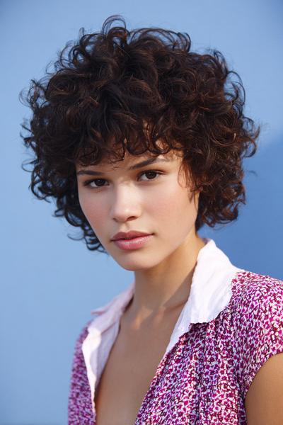12. Short Curly Shag with Wispy Layers for hairstyles for curly hair short ideas