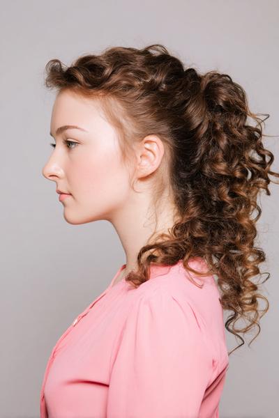 15. Side-Parted Curly Ponytail with Wrapped Base for hairstyles for curly hair easy ideas