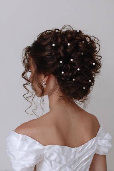 19. Romantic Curly Chignon with Pearly Pins for hairstyles for curly hair updo ideas