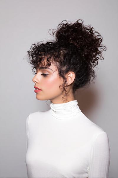 20. High Curly Updo with Defined Tendrils for hairstyles for curly hair updo ideas