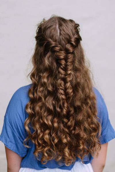 22. Loose French Braid with Curly Ends for hairstyles for curly hair braids ideas