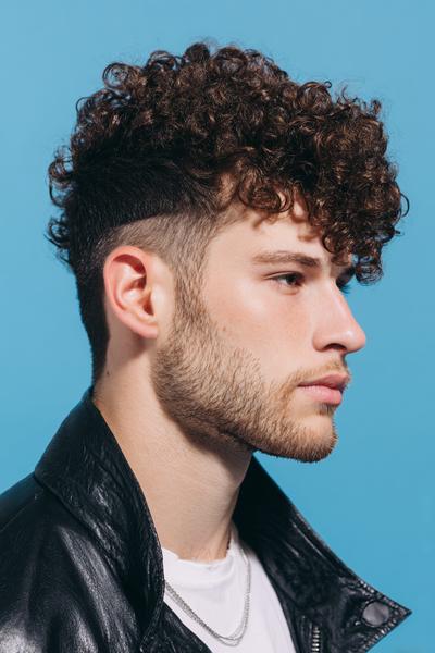4. Curly Taper Fade with Line-Up for hairstyles for curly hair men ideas