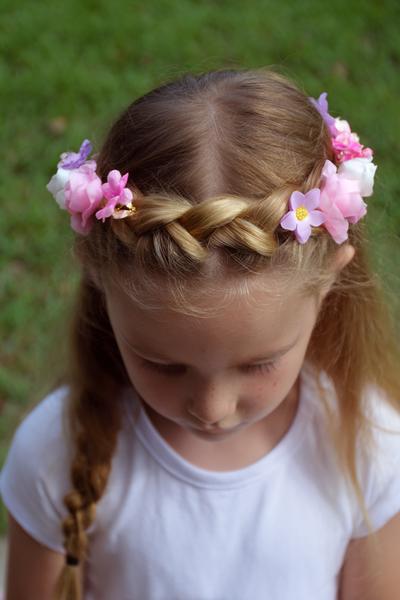 9. Halo Crown Braid with Flower Clips for hairstyles for kids braids ideas