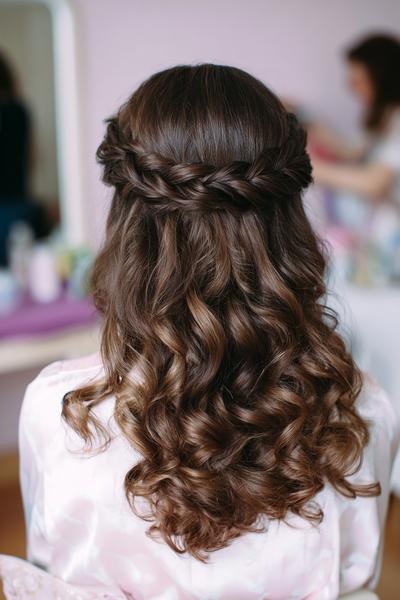 5. Romantic Crown Braid Halo with Loose Curls for hairstyles for long hair wedding ideas