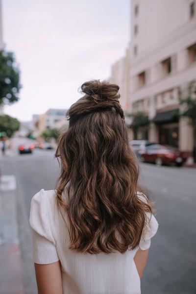 3. Half-Up Top Knot with Loose Waves for hairstyles for medium length hair easy ideas