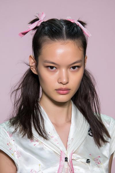 6. Double Mini Ponytails with Center Part for hairstyles for medium length hair school ideas