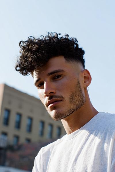 13. Defined Curly Top Fade for hairstyles for men curly hair ideas