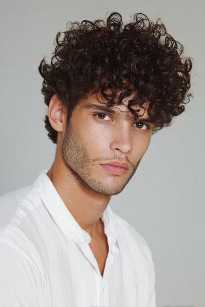 14. Curly Fringe with Tapered Sides for hairstyles for men curly hair ideas
