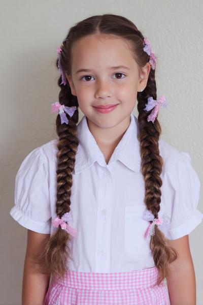12. Fishtail Braid Pigtails with Tiny Flower Clips for hairstyles for school braids kids ideas