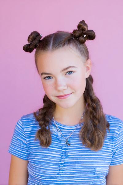 14. Braided Space Buns with Center Part for hairstyles for school braids 4th grade ideas