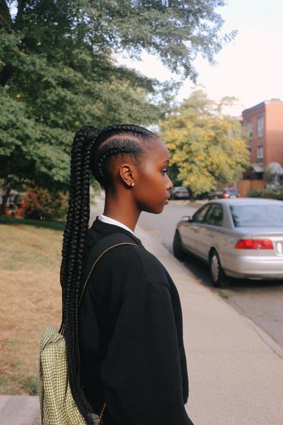 3. Side-Swept Ghana Braids with Soft Swooped Edges for hairstyles for school braids black ideas