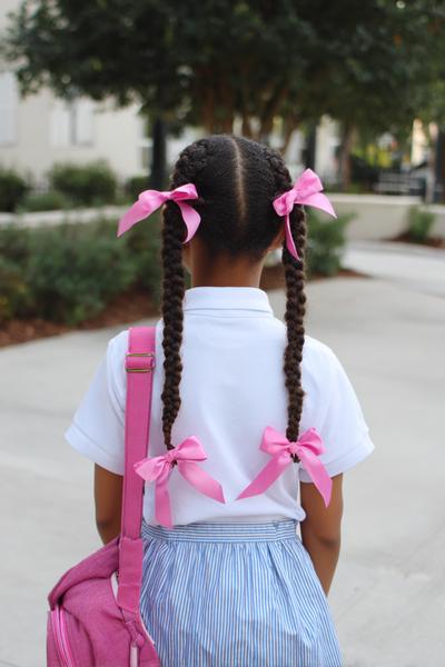 7. Bubble Braid Cornrow Pigtails with Satin Bows for hairstyles for school braids black kids ideas