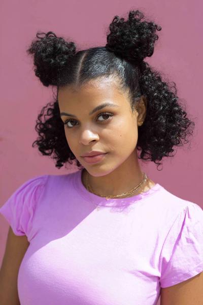 3. Double Puff Space Buns for Hairstyles for School Curly Hair Tied Up with Clean Side Parts