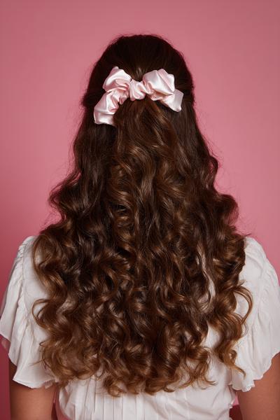 14. Defined Ringlet Refresh With Satin Scrunchie Half-Up for hairstyles for school down curly hair ideas