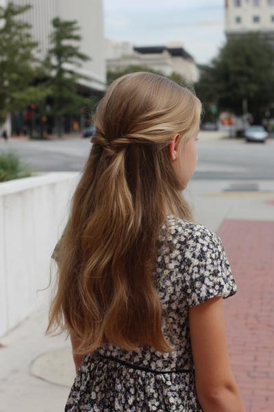 17. Museum-Day Sleek Tuck and Clip for hairstyles for school downtown ideas