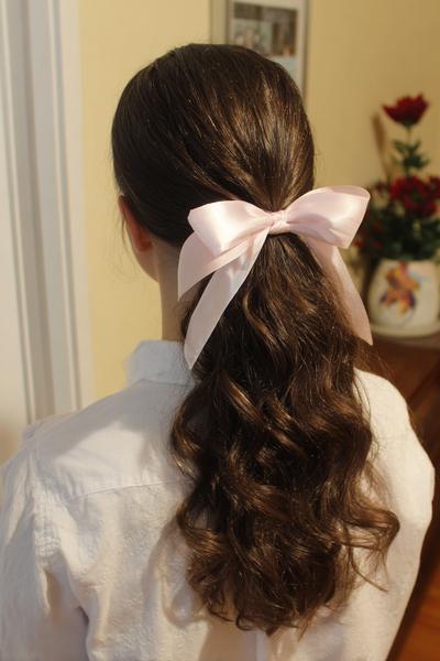 17. Half-Up Bow Pony Hairstyles for School Easy Cute With Ribbon and Soft Waves