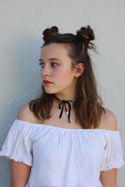 18. Space Buns Hairstyles for School Easy Cute With Center Part and Wispy Front Pieces