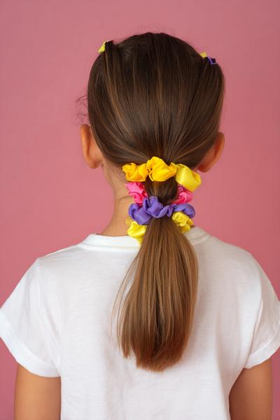 10. No-Fuss Bubble Ponytail With Bright Elastics for hairstyles for school kids easy ideas