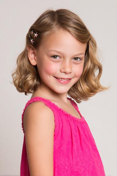 26. Short Side-Swept Waves With Star Clips for hairstyles for school kids short ideas