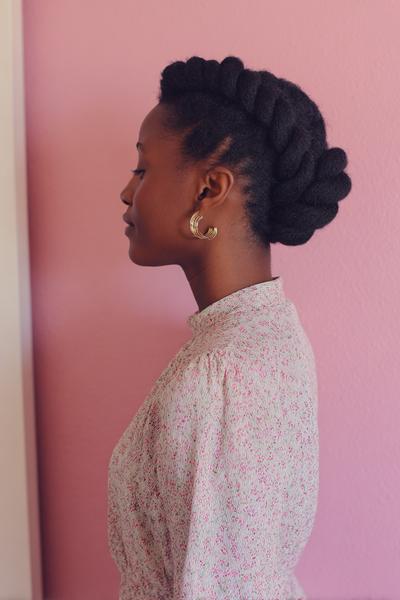 7. Flat-Twist Updo with Soft Edges for Hairstyles for School Natural Hair 4C Ease