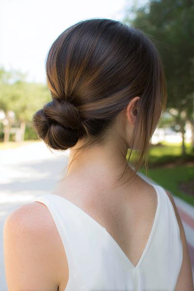 5. Sleek Low Bun with Middle Part for hairstyles for school straight hair up ideas