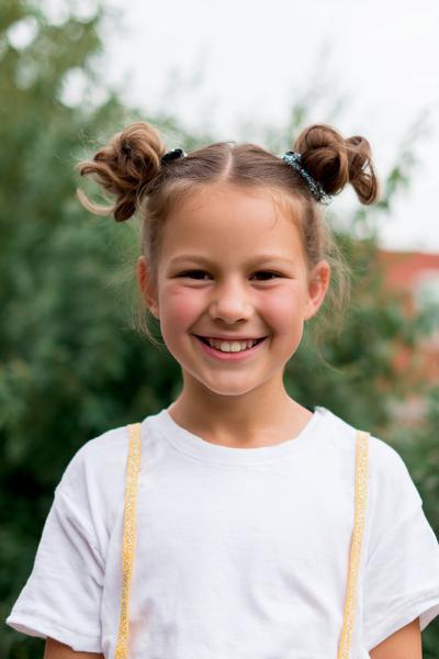 7. Pigtail Space Buns for Hairstyles for School Kids with Glitter Part