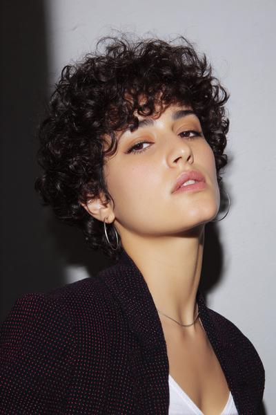 6. Curly Shag Crop with Wispy Layers for hairstyles for short hair curly ideas