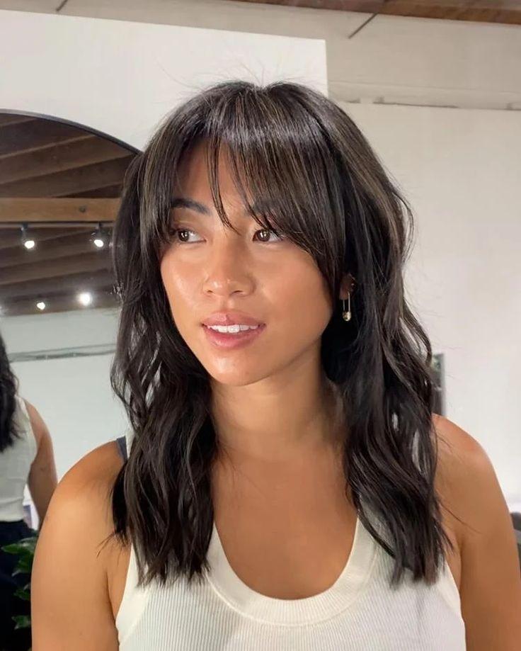 Low maintenance wispy curtain bangs