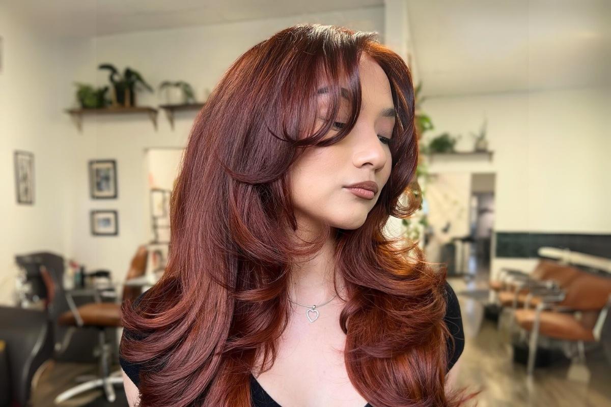 Red hair blowout layers curtain bangs