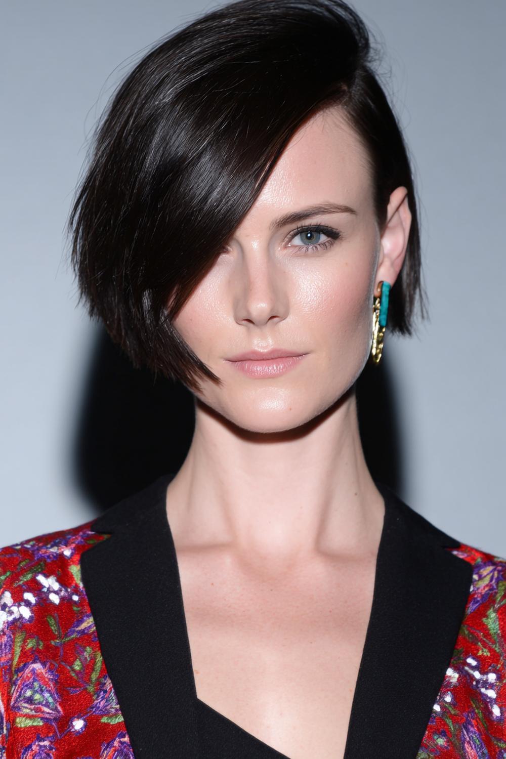 12. Short Hair Idea: Asymmetrical Bob with Sharp Angle and Sleek Finish