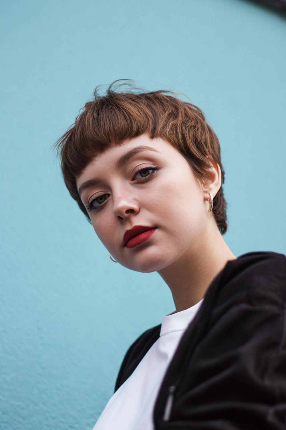 15. Short Hair Idea: Short Cut with Micro Bangs and Smooth Crown