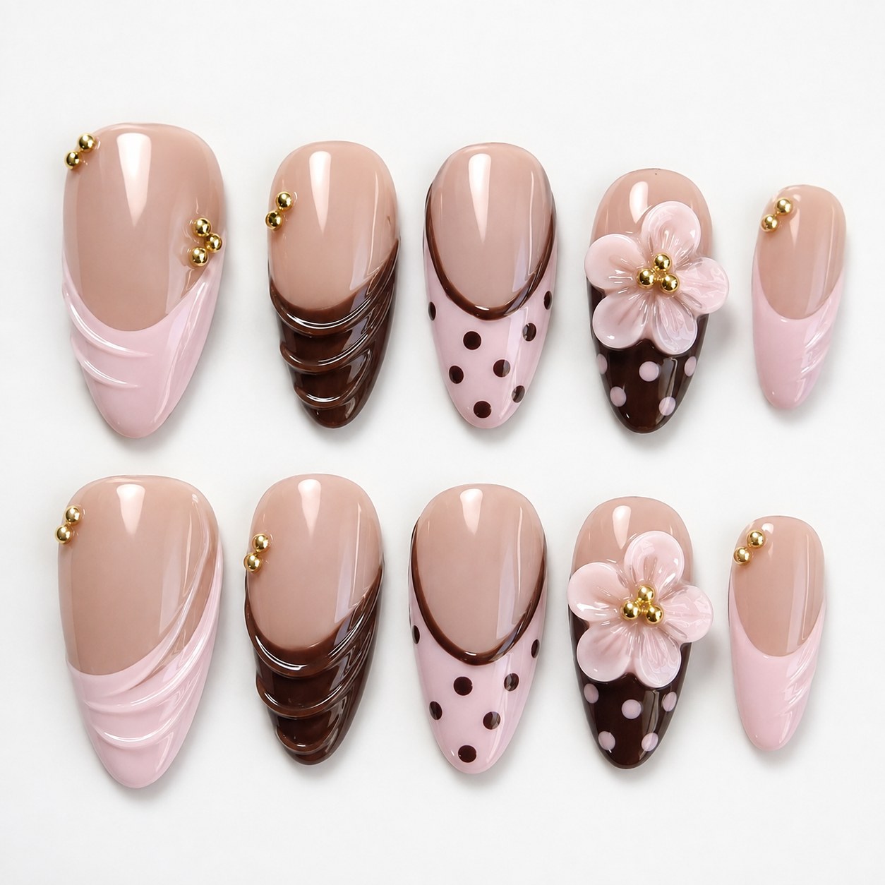 Chocolate and pink swirl French manicure with a 3D flower charm and gold beads