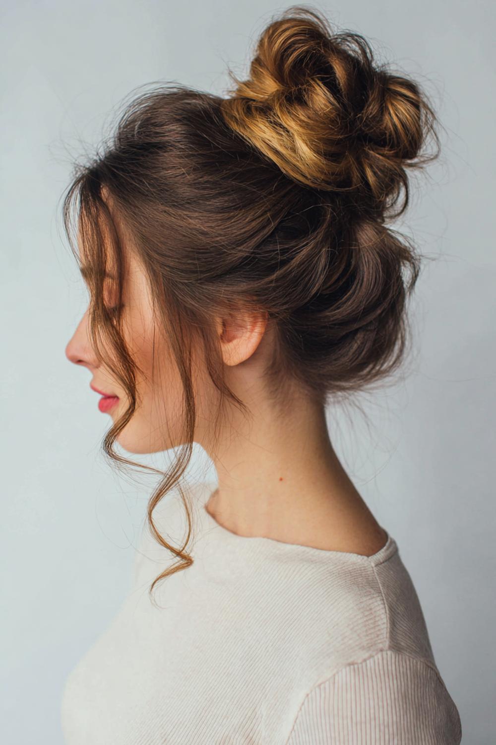 13. Simple Hairstyles for Long Hair: Messy Bun With Texture and Pinched Volume