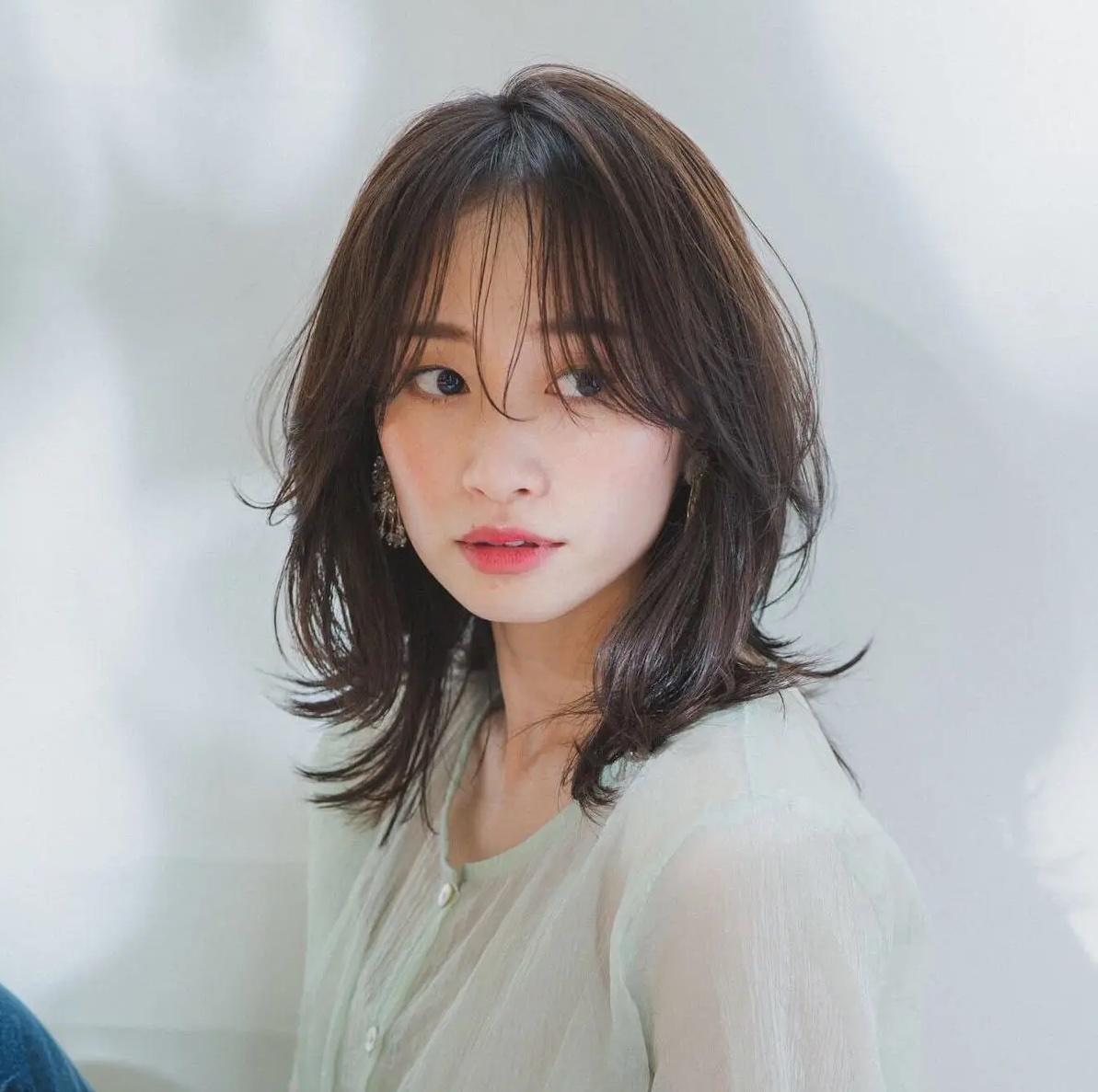 Medium length soft wolf cut