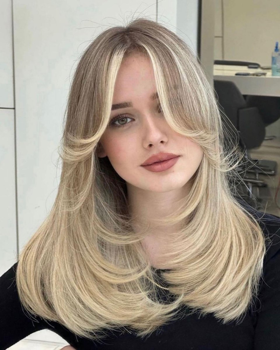 Thick curtain bangs haircut