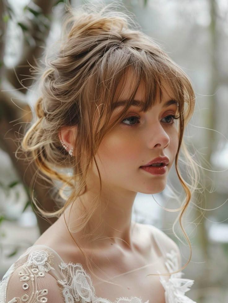 Updo with wispy curtain bangs